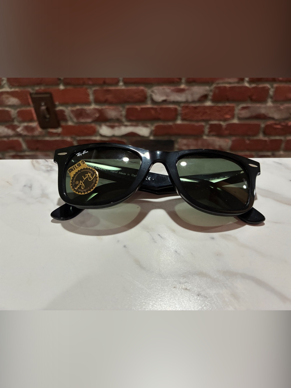 Ray-Ban Black Frame Sunglasses with Green Lenses
